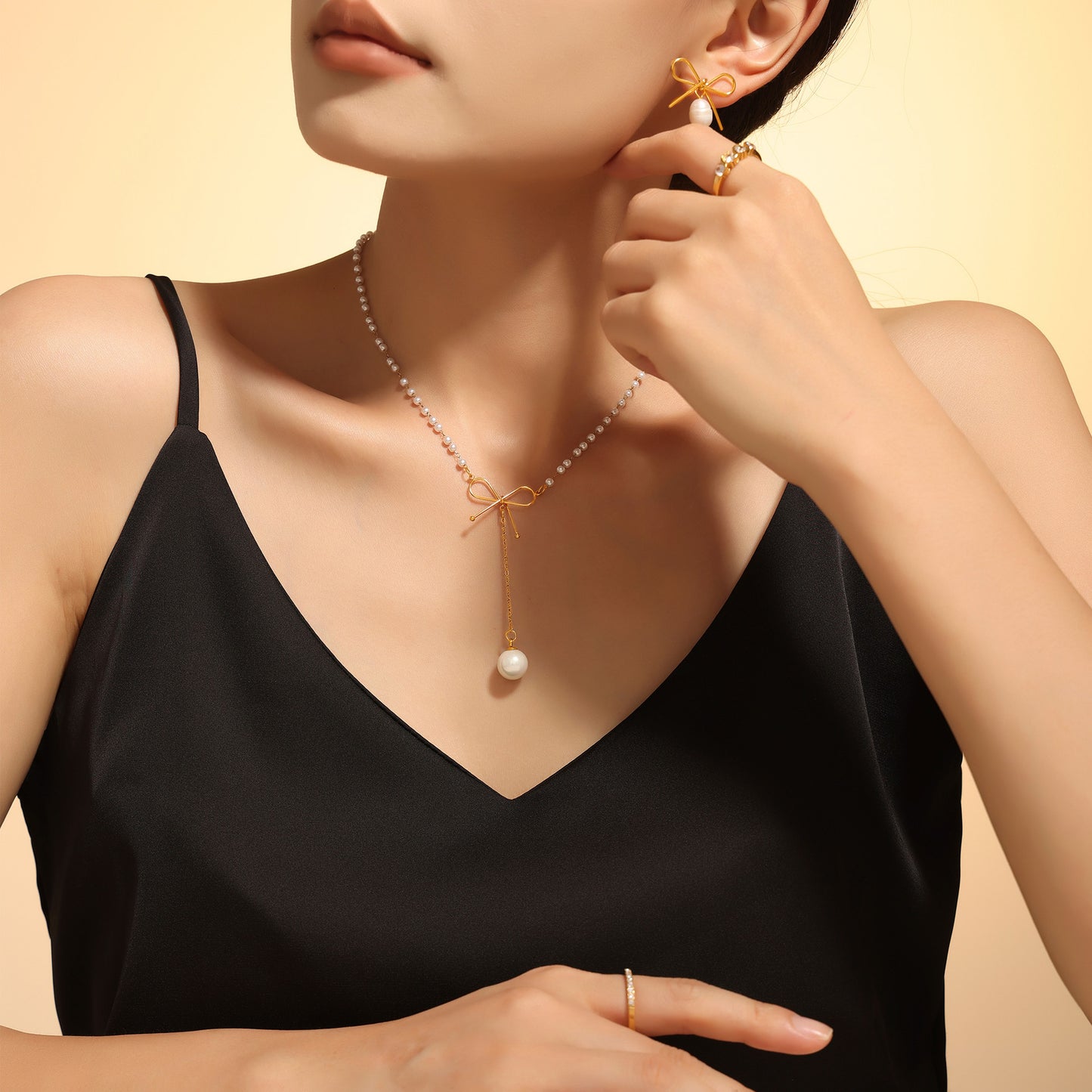 Stainless Steel Bow Imitation Pearl Lariat Necklace