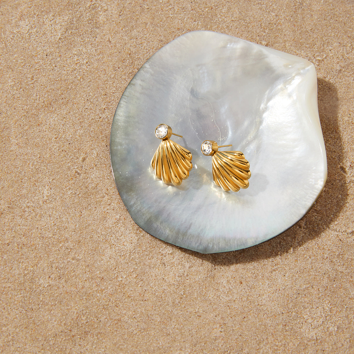 Stainless Steel White CZ Ribbed Fan-shaped Shell Earrings