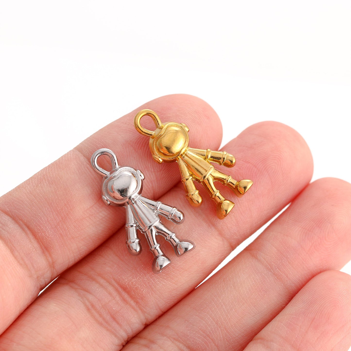 Pendentif astronaute en acier inoxydable et PVD or 18 carats