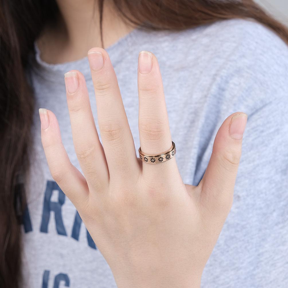 Bague rotative en acier inoxydable à motif floral pour hommes et femmes