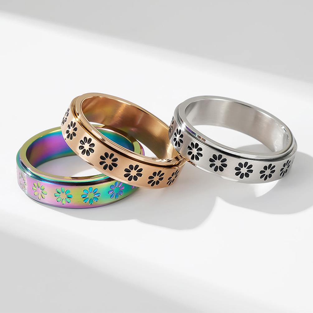 Bague rotative en acier inoxydable à motif floral pour hommes et femmes
