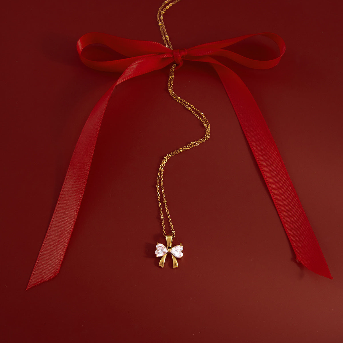 Stainless Steel Bowknot Cubic Zirconia Heart Necklace