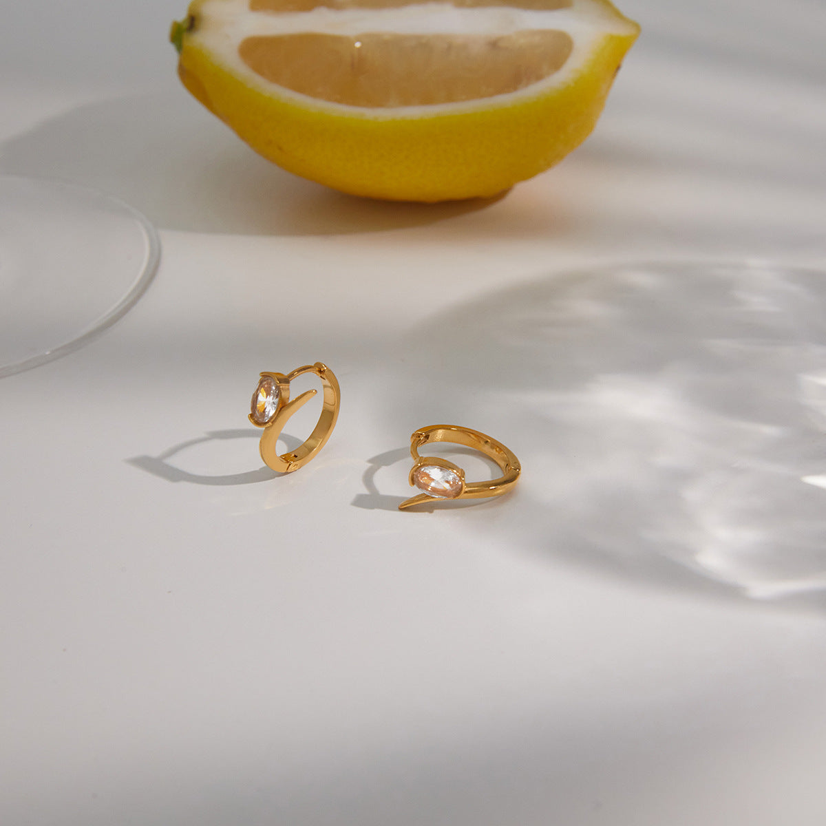 Stainless Steel White Egg-shaped CZ Linear Hoop Earrings