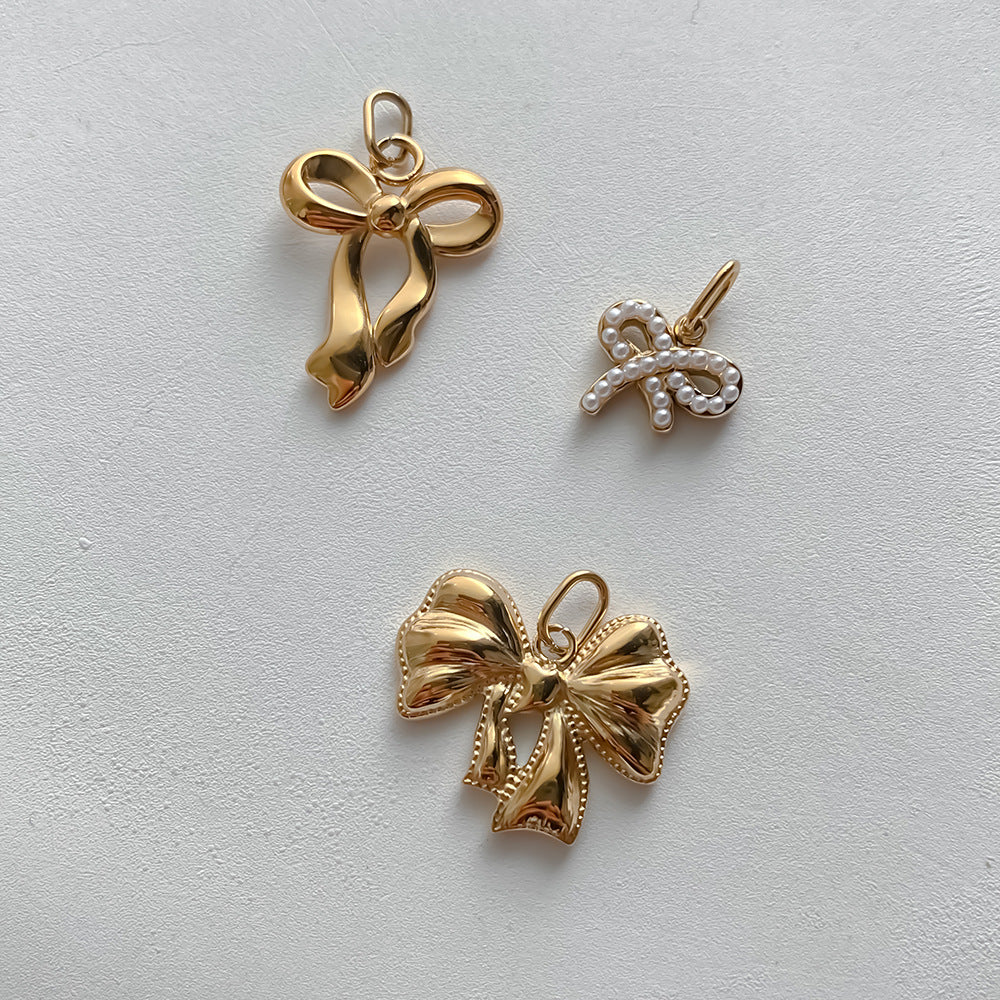 Stainless Steel Hollowed-out Bowknot Series Pendant