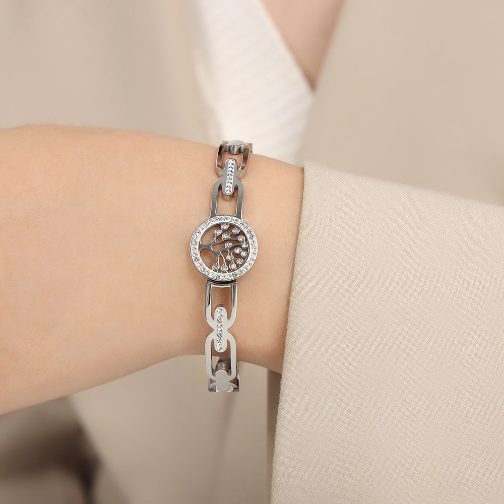 Bracelet en acier inoxydable avec motif creux en zircon cubique
