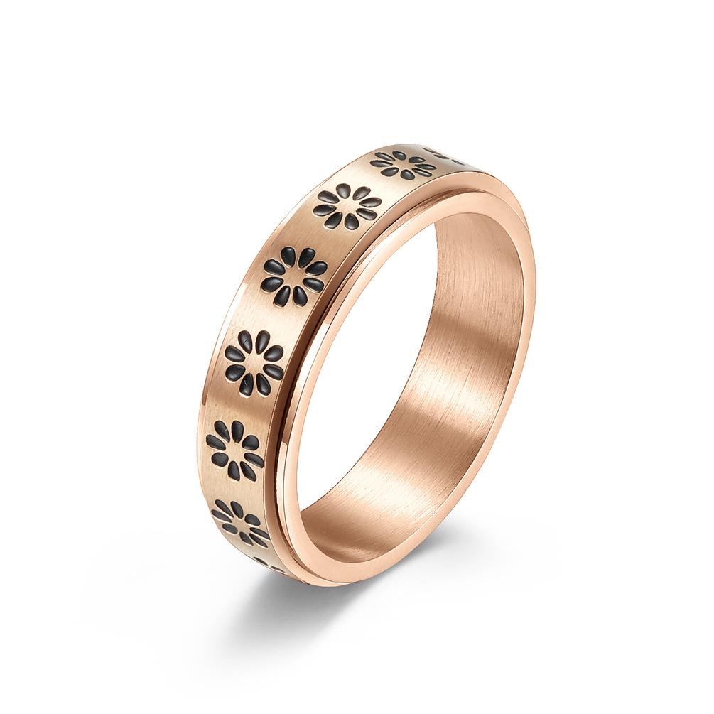 Bague rotative en acier inoxydable à motif floral pour hommes et femmes