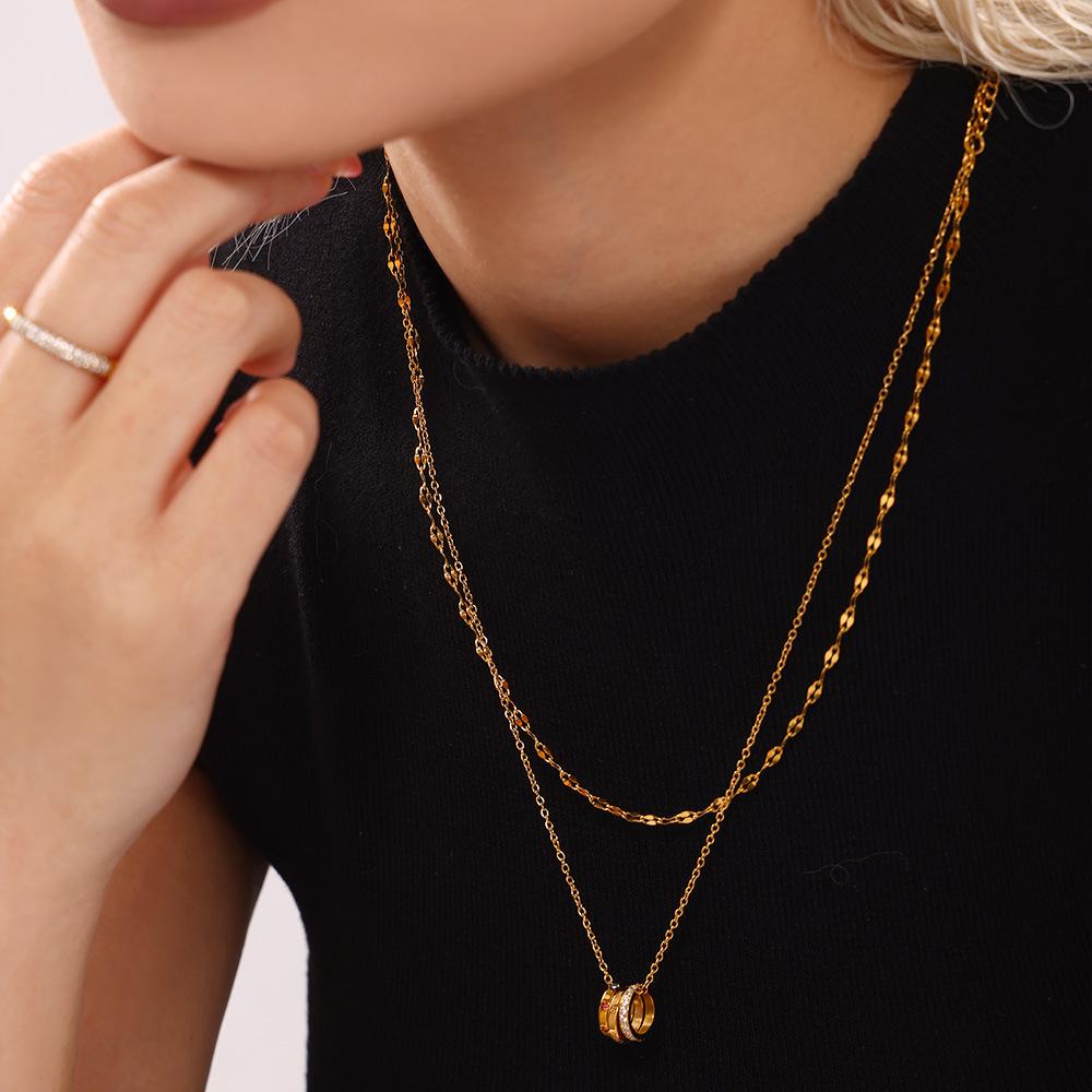 Collier pendentif en acier inoxydable avec incrustation d'anneau et zircone cubique